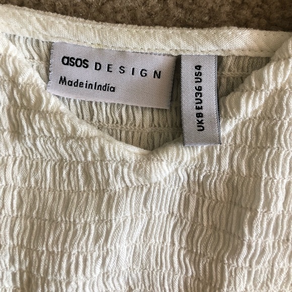 ASOS DESIGN peplum top in ivory. Size US 4. - Picture 8 of 11